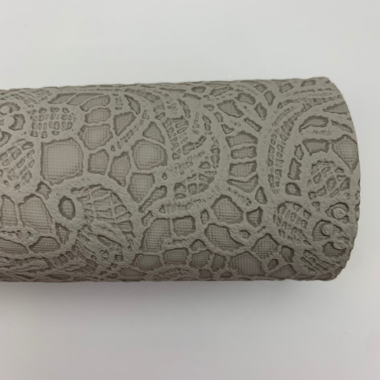 Buttery Floral Embossed Faux Leather