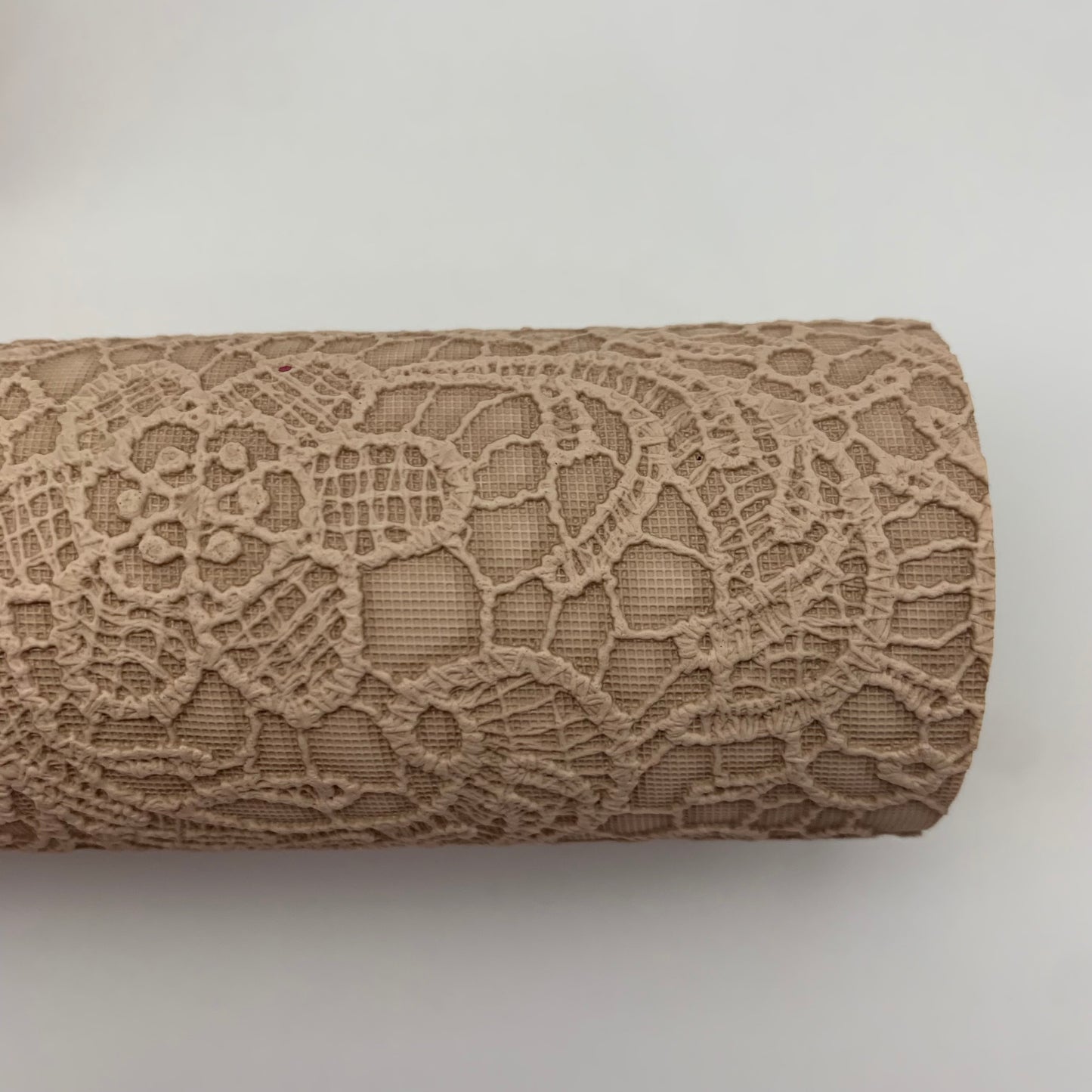 Buttery Floral Embossed Faux Leather