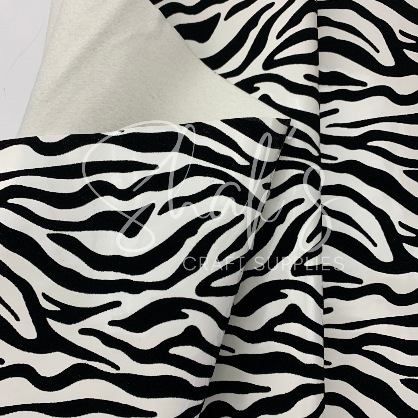 Zebra and Giraffe Velvet Embossed Vinyl Faux Leather 1/2 Yard Rolls