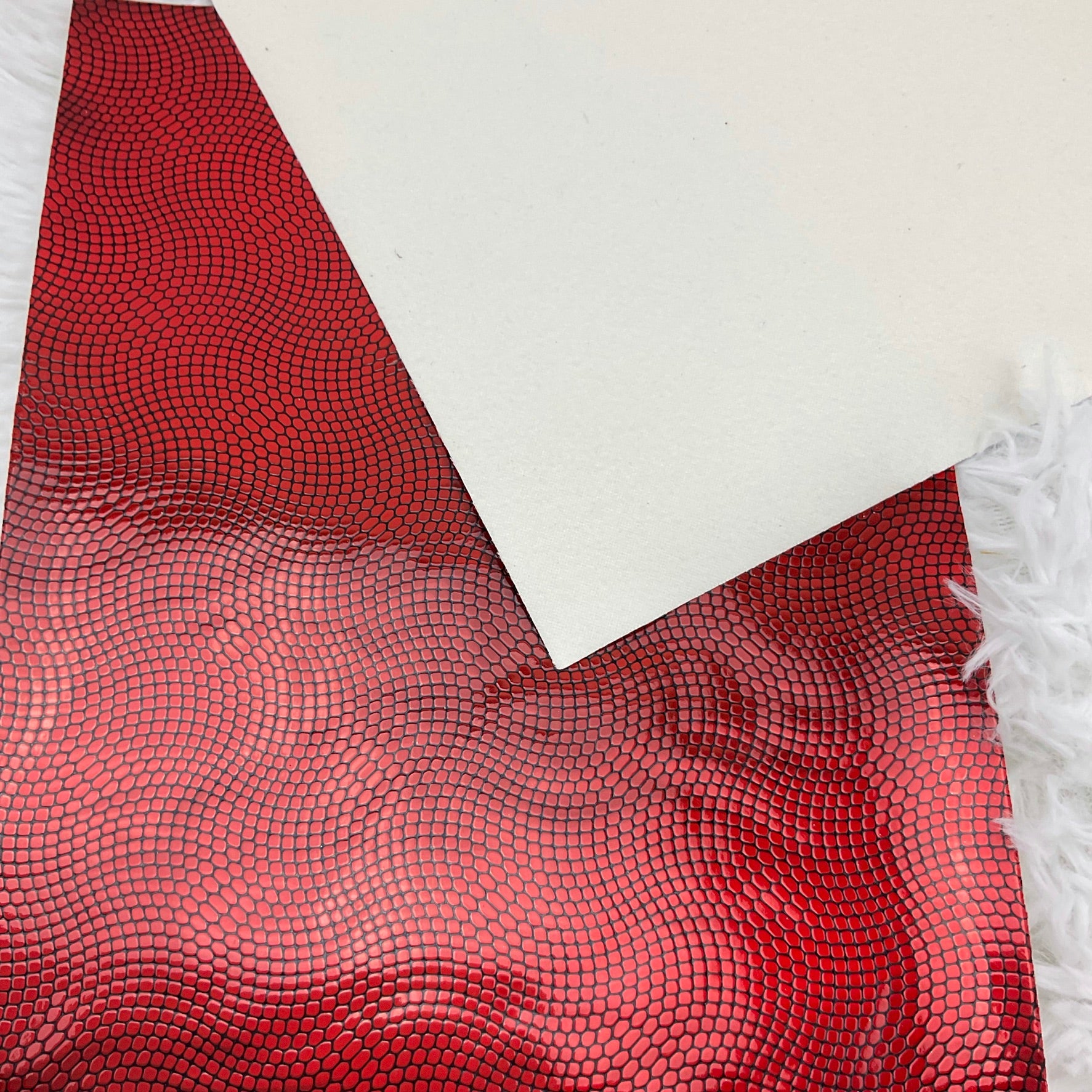 Red and Black Embossed Pebbles Glossy Faux Leather