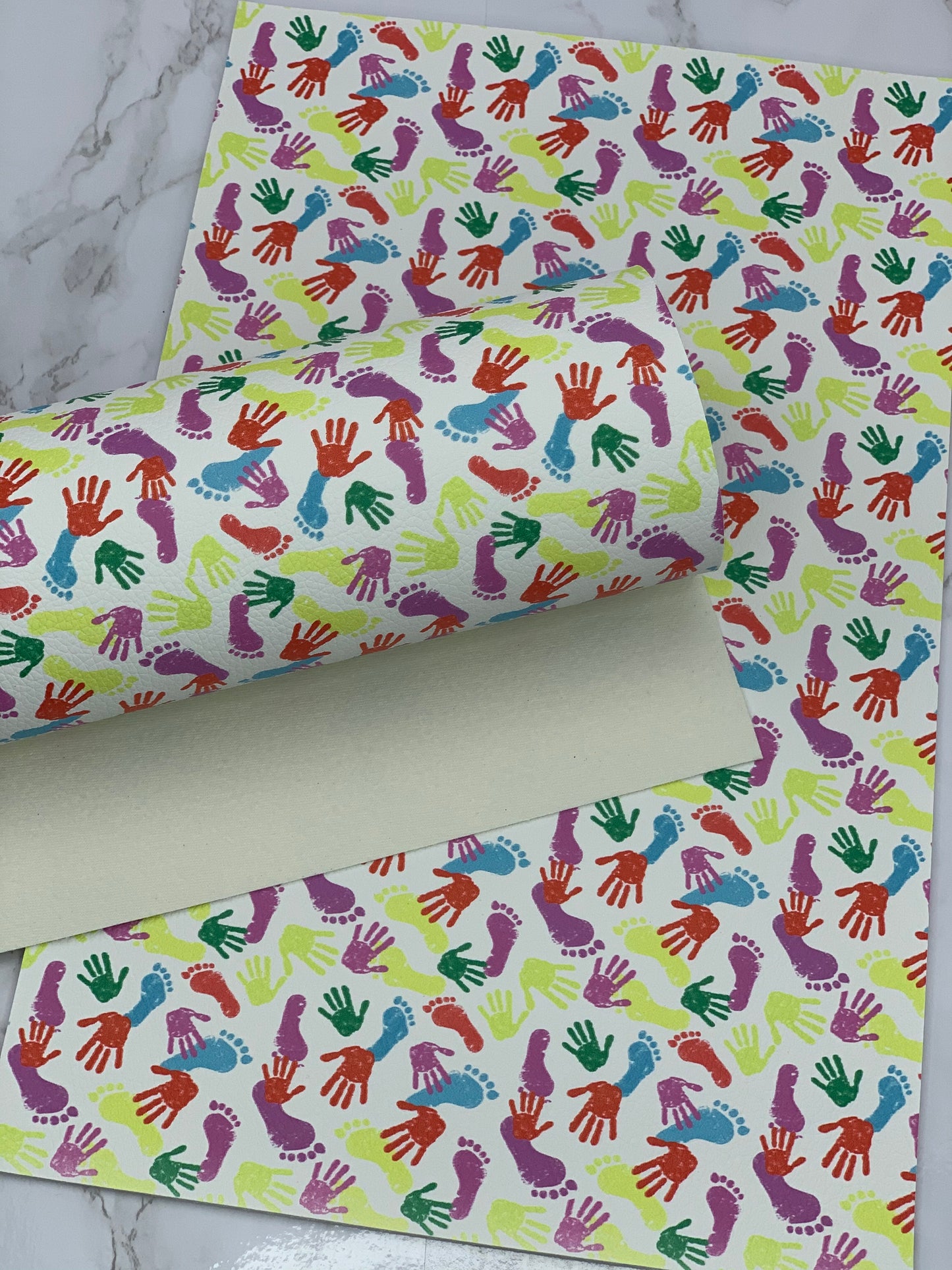 Hand and Foot Prints Pebbled Litchi Faux Leather