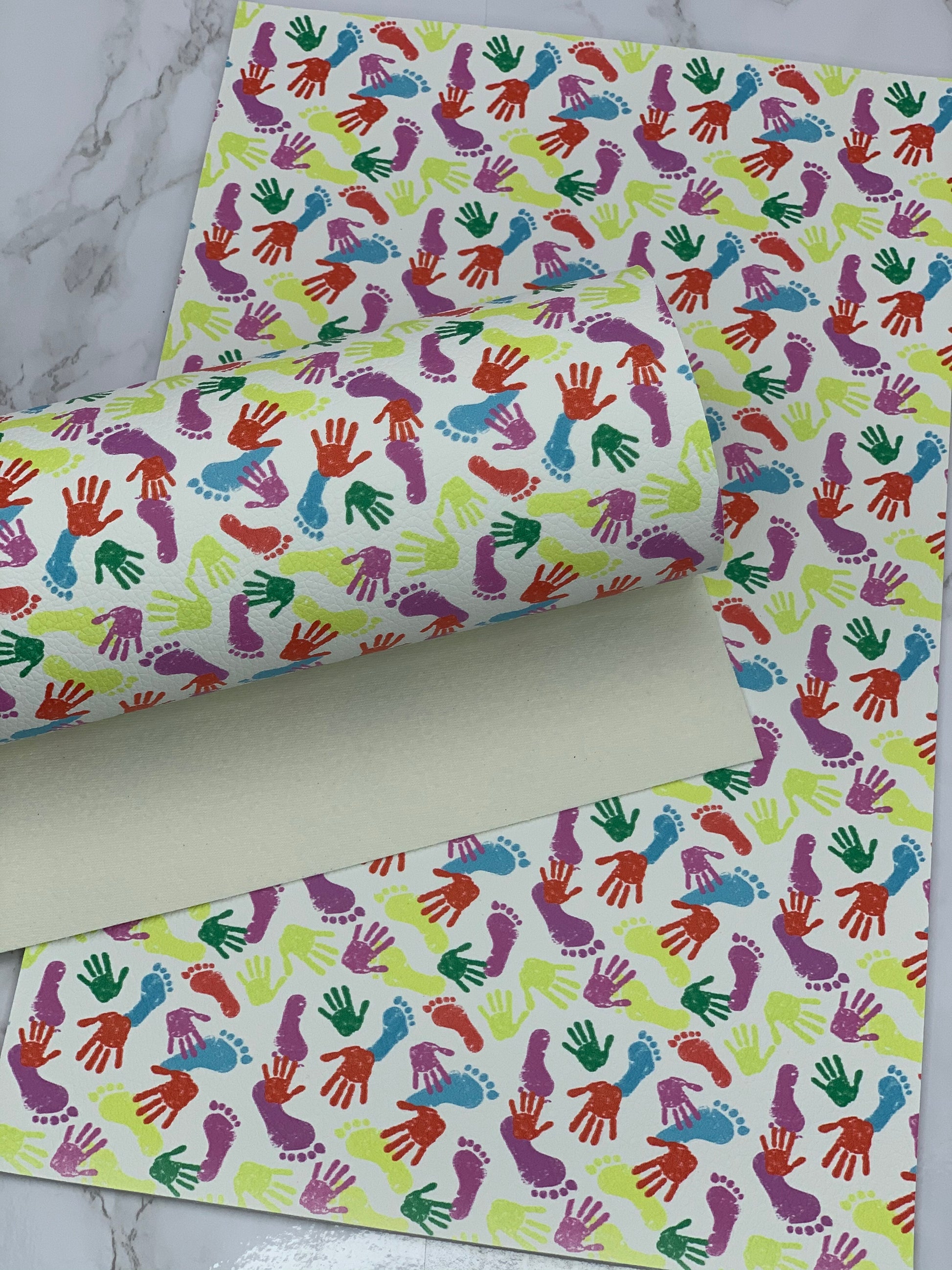 Hand and Foot Prints Pebbled Litchi Faux Leather